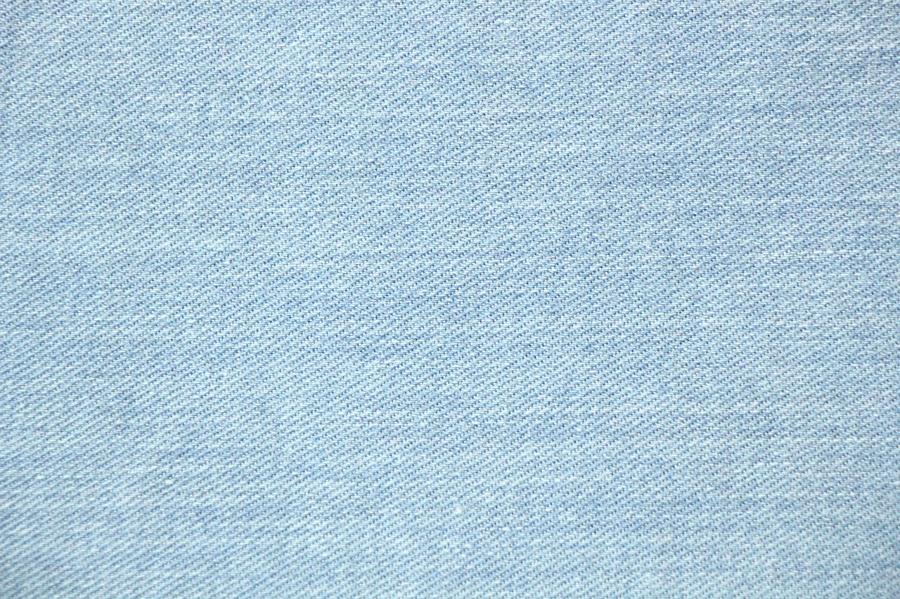 a close up of a piece of blue fabric, a stock photo, 1128x191 resolution, tight denim jeans, wearing a light blue shirt, illustration sharp detail
