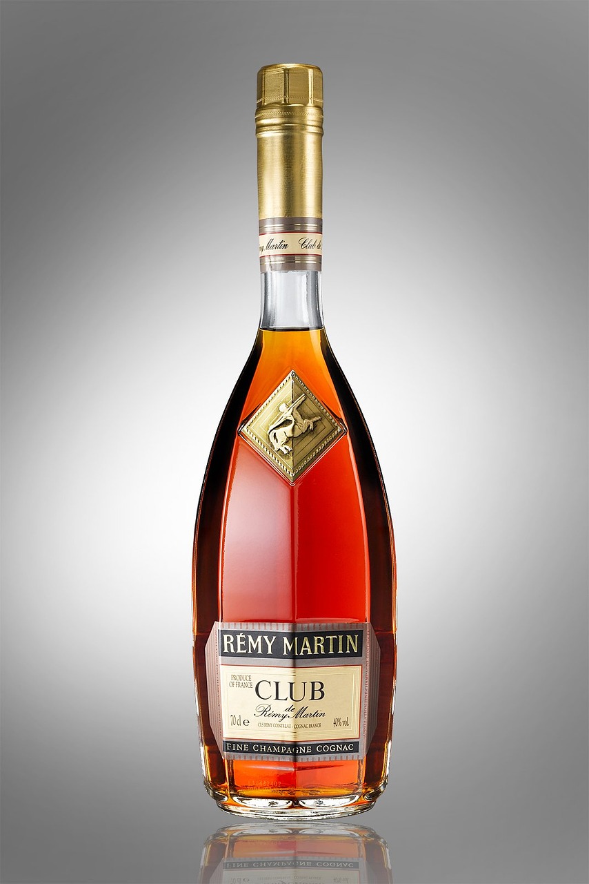 a close up of a bottle of alcohol, inspired by Carlo Martini, rembranlt, press release, club, rodney matthew