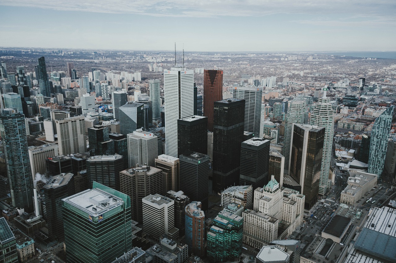 a view of a city from the top of a building, by Seb McKinnon, pexels contest winner, toronto, 1 0 2 4 x 7 6 8, small buildings, aerial photo