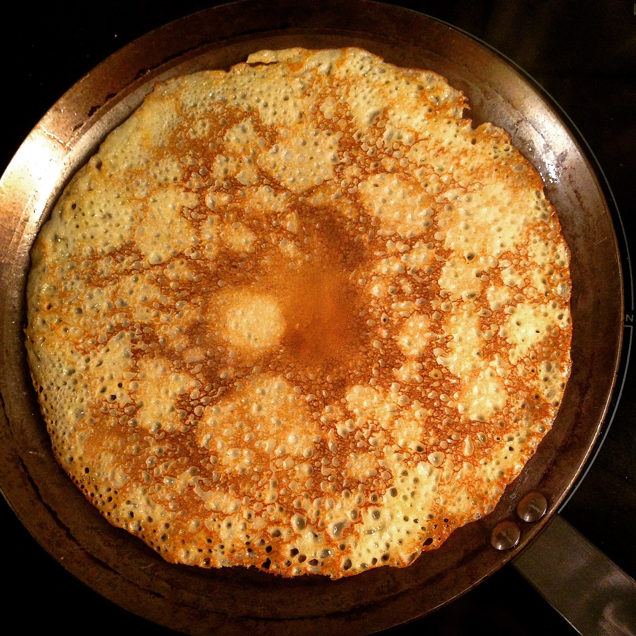 a pan filled with food sitting on top of a stove, a stipple, by Jason Felix, flickr, hurufiyya, pancakes, bottom - view, recipe, pastelle