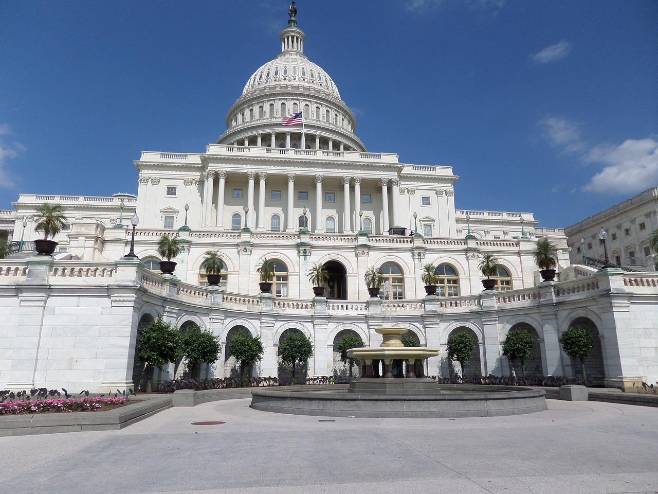 a large white building with a fountain in front of it, a picture, by Tom Carapic, flickr, capitol building, usa-sep 20, not cropped, inside a grand