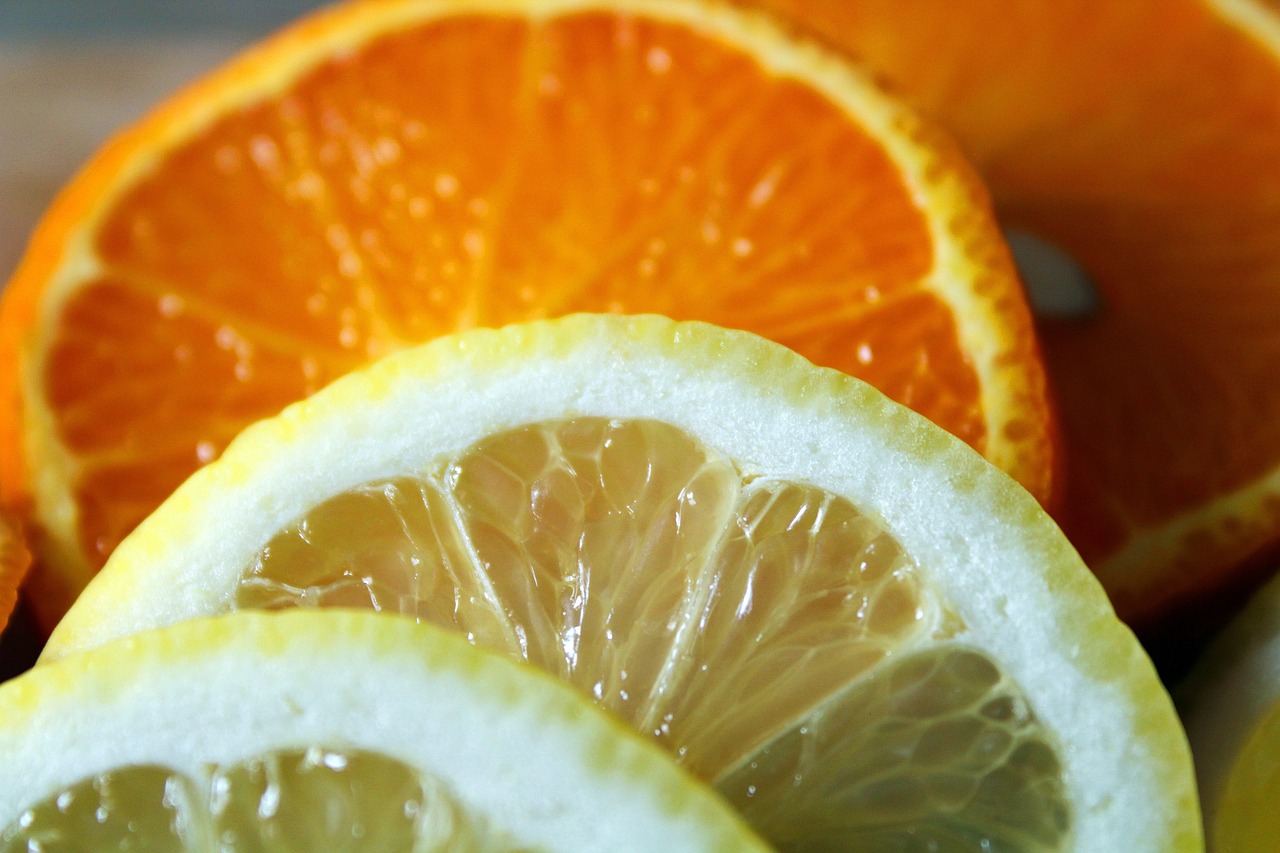 a close up of sliced oranges and lemons, 3 4 5 3 1, closeup - view, orange mist, profile picture