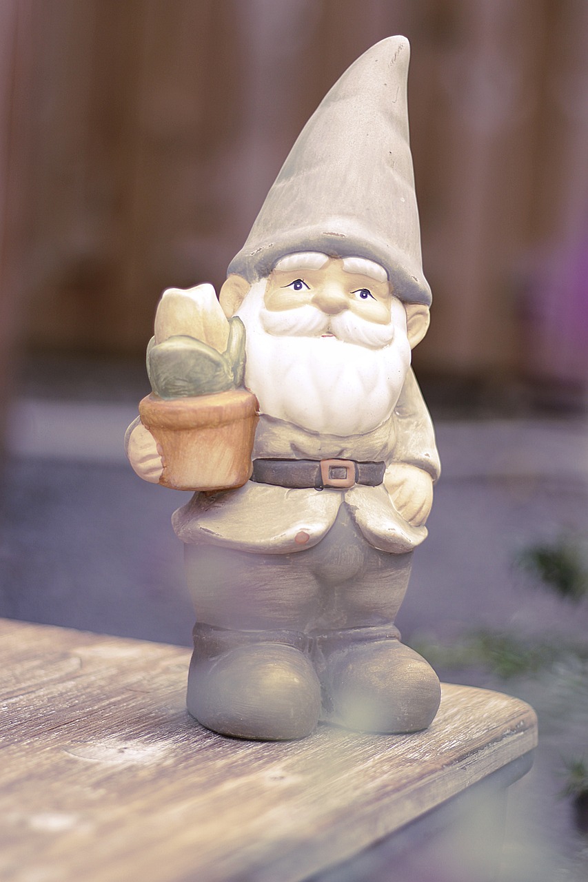 a statue of a gnome holding an ice cream cone, a statue, flickr, folk art, cactus, soft image shading, gimli, basil
