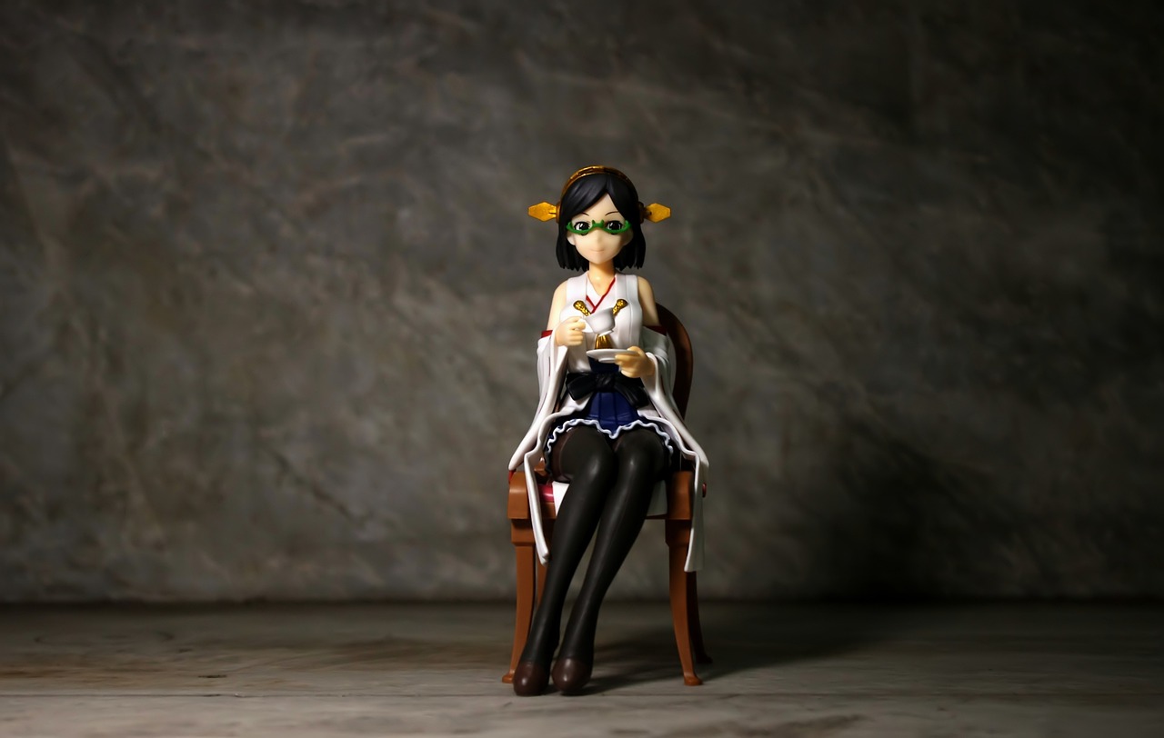 a figurine of a woman sitting in a chair, a picture, unsplash, shin hanga, albedo from overlord, with glasses, !!posing_as_last_supper, artdoll