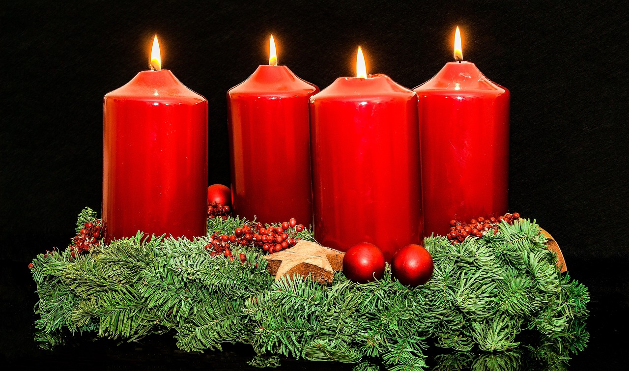 a group of red candles sitting on top of a christmas wreath, a photo, by Alexander Fedosav, pixabay, fine art, in a row, hd —h 1024, on a sumptuous velvet tablecloth, on black background