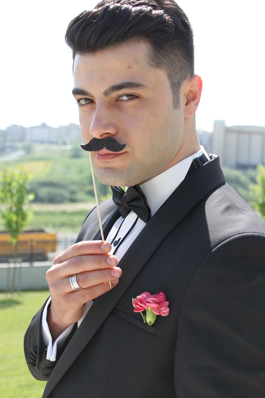 a man in a tuxedo with a fake moustache on his face, a picture, inspired by Cristache Gheorghiu, tumblr, romanticism, turkey, wedding photo, can basdogan, high res