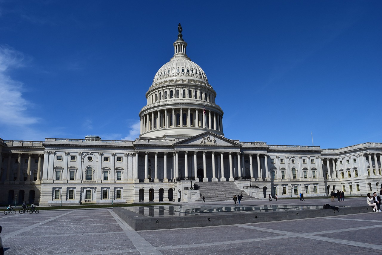 a large white building with a fountain in front of it, by Tom Carapic, pixabay, state of the union, signing a bill, view from ground level, wide panoramic shot