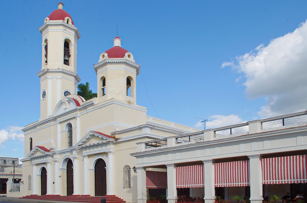 a large white building with a red roof, inspired by Francisco Zúñiga, art deco, churches, cuba, cathedral, rosalia