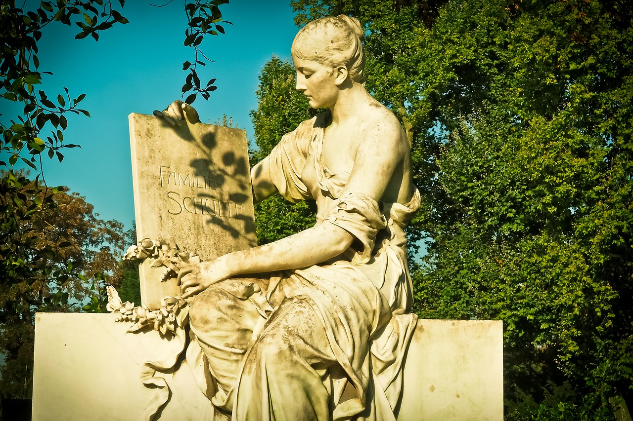a statue of a woman reading a book, inspired by Antonio Canova, flickr, watermarked, london cemetery, the goddess of autumn harvest, hot summer sun