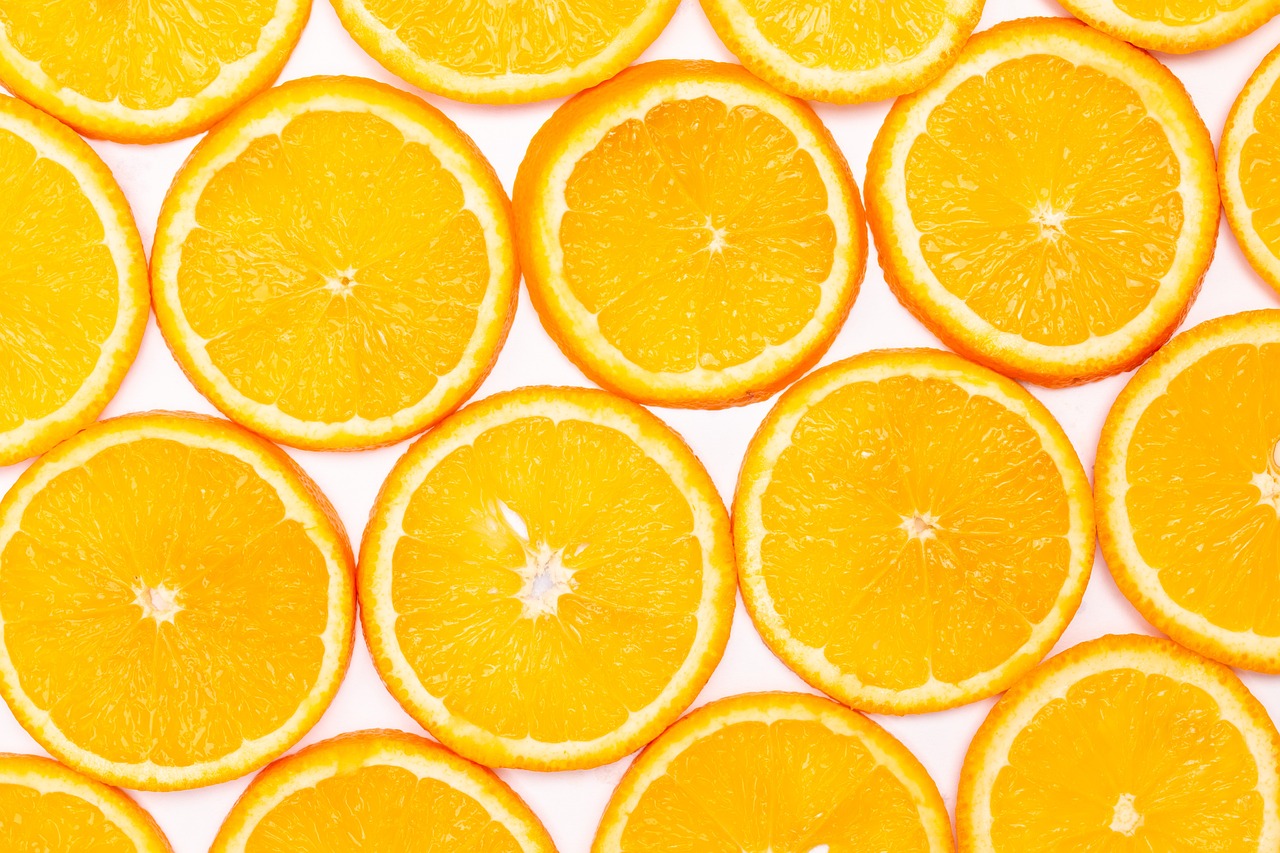 a group of orange slices sitting on top of each other, a stock photo, pexels, minimalism, yellow aureole, 🦩🪐🐞👩🏻🦳, background is white, multiple suns