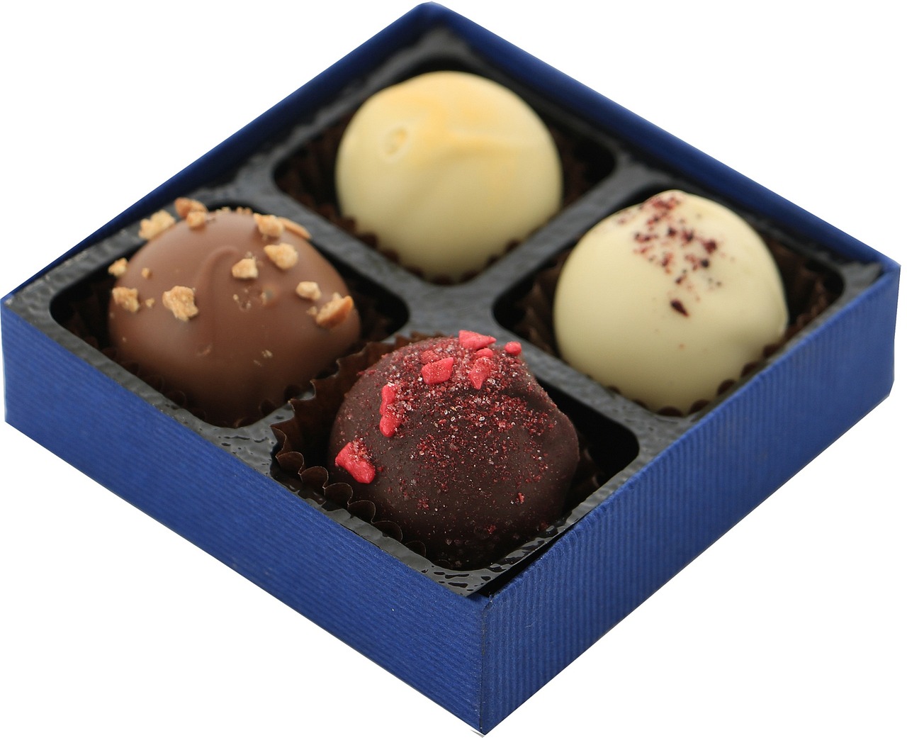 four chocolates in a blue box on a white surface, prussian blue and venetian red, -w 1024, front facing, british