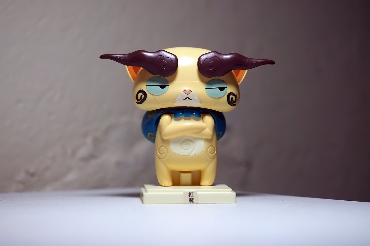 a close up of a figurine of a cat, inspired by Kaigetsudō Anchi, flickr, mascot pop funko, minotaur, full front view, a horned