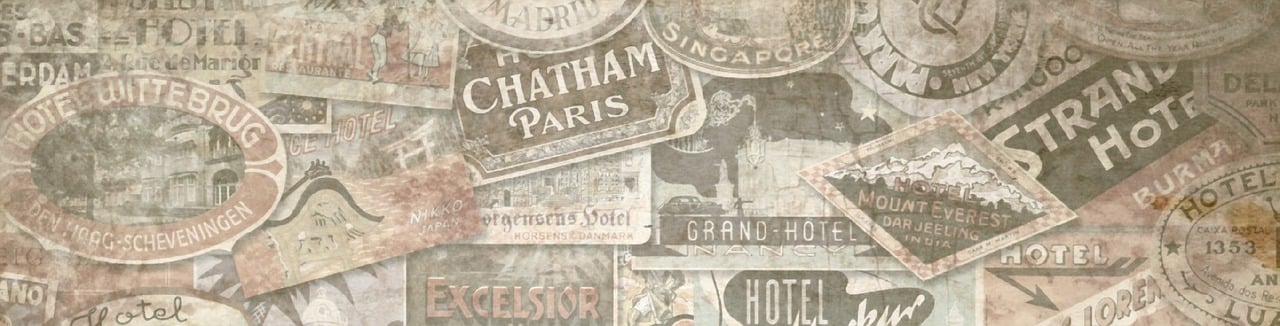 a wall covered in lots of different types of signs, a photo, inspired by Michel Delacroix, trending on cg society, art nouveau, paris hotel style, paper texture 1 9 5 6, vintage - w 1 0 2 4, gray