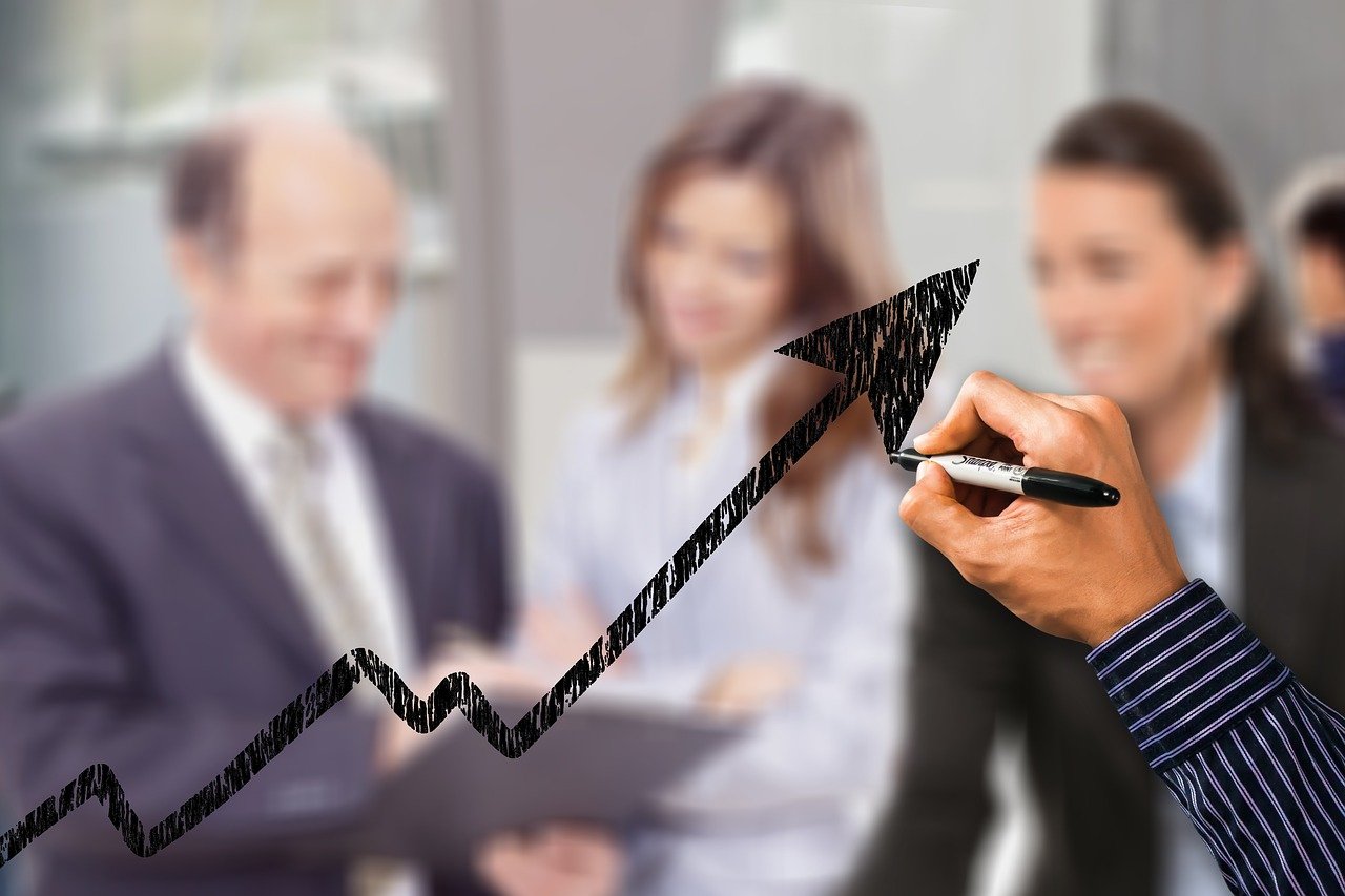 a man is drawing a graph on a board, a photo, shutterstock, in meeting together, corner office background, high res photo, arrow