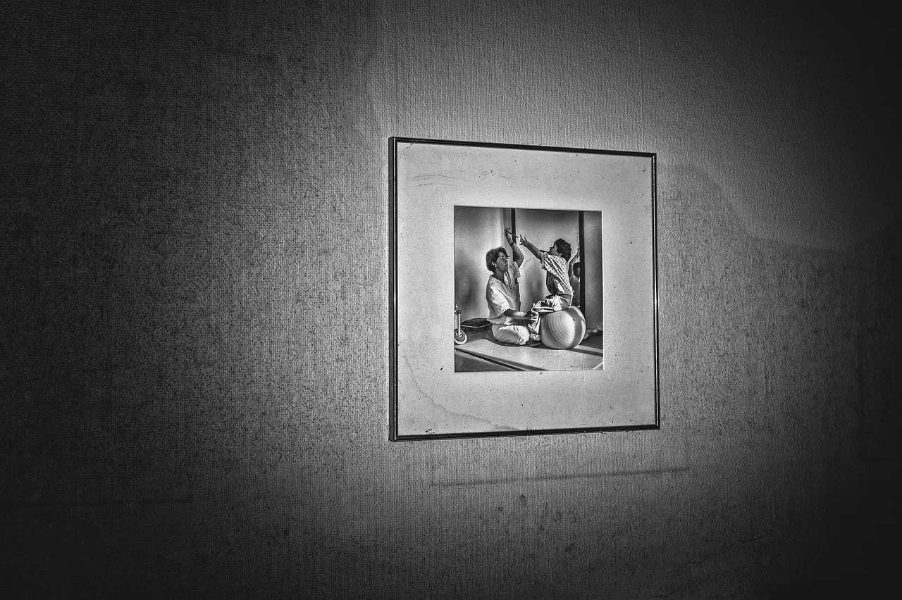 a black and white photo hanging on a wall, featured on flickr, art photography, inside a frame on a tiled wall, private moment, mate painting, complex composition!!
