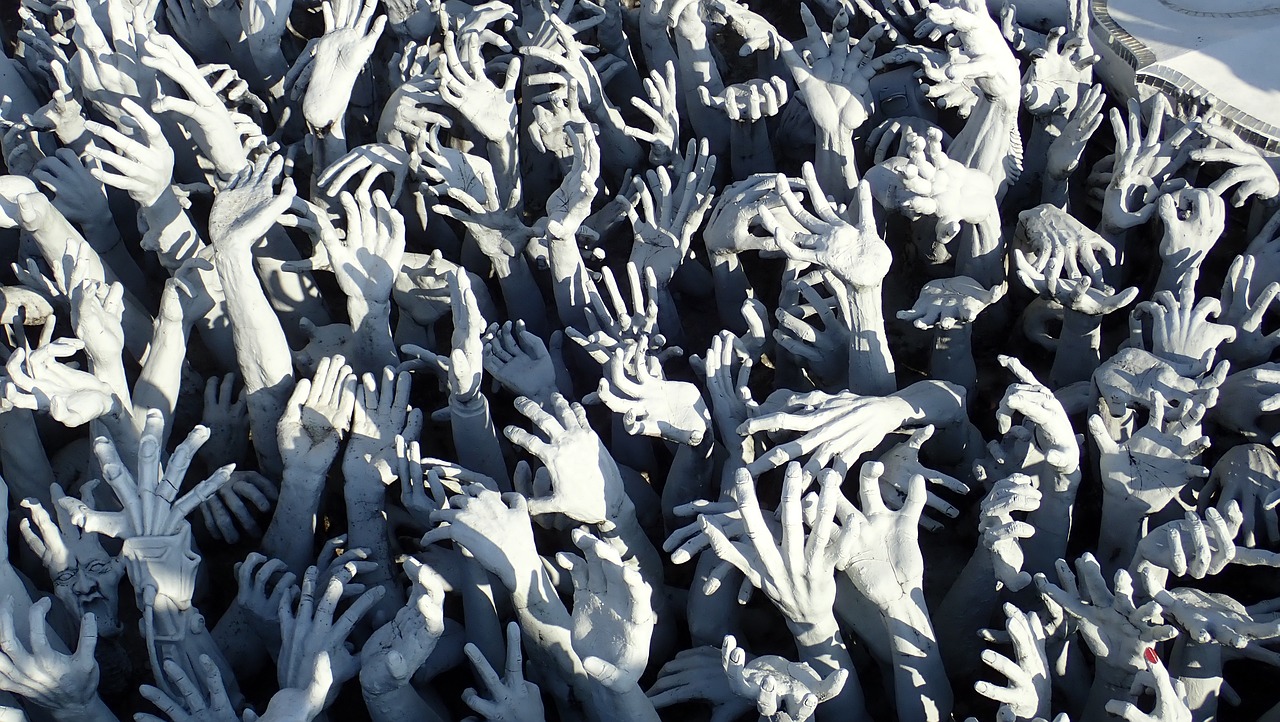 a large group of people with their hands in the air, by Ai Weiwei, concrete art, closeup - view, zombie horde, gary chalk, porcelain sculpture