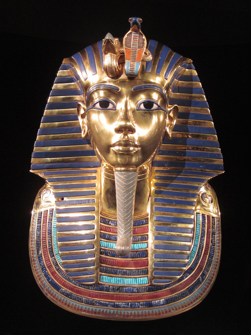 a close up of a gold mask on a black background, egyptian art, by Scott M. Fischer, hurufiyya, sapphire, from wikipedia, the sphinx, tupac