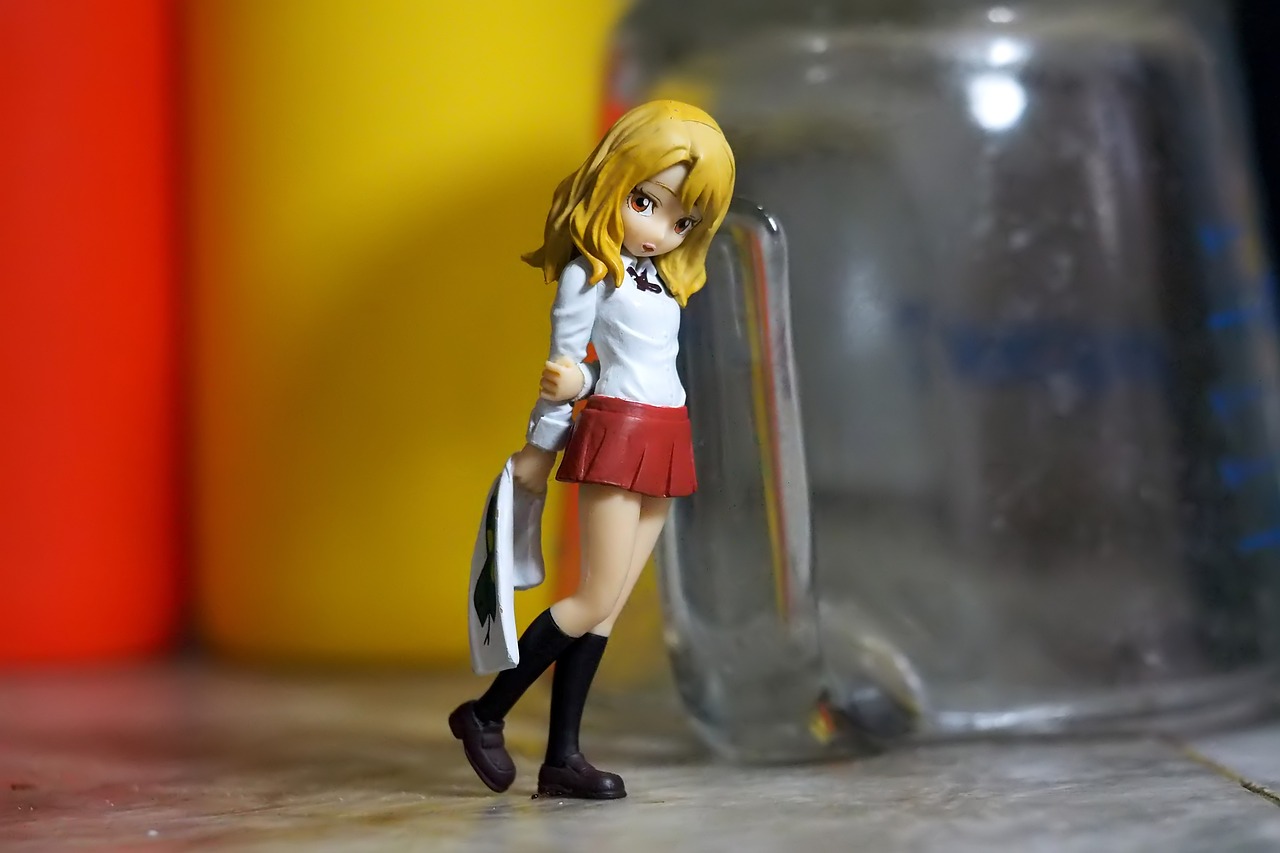 a close up of a figurine of a girl with a sword, a tilt shift photo, inspired by Riusuke Fukahori, tumblr, anime girl drinks energy drink, standing in corner of room, blonde girl, experimenting in her science lab
