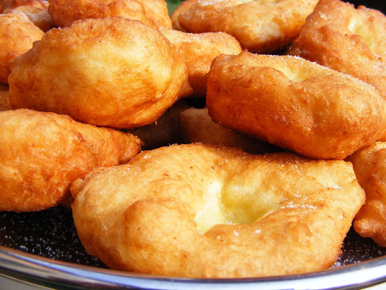 a close up of a plate of doughnuts on a table, inspired by Géza Dósa, hurufiyya, deep fried, pancakes, hasbulla magomedov, square