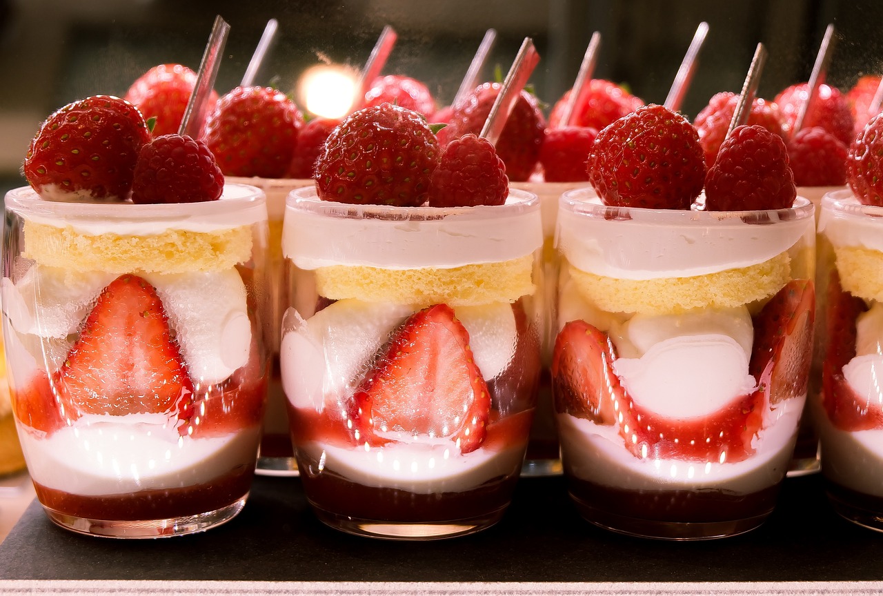 a row of desserts with strawberries and whipped cream, a picture, by Etienne Delessert, pexels, romanticism, koji morimoto shinjuku, 5 0 mm, multilayer, summer night