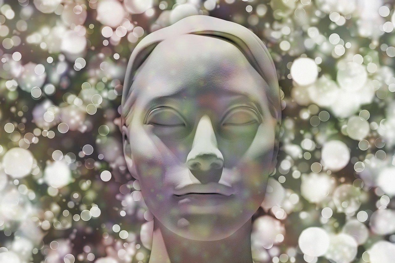 a close up of a statue of a woman's face, digital art, inspired by Yue Minjun, digital art, bokeh. iridescent accents, blurred and dreamy illustration, a cyborg meditating, face photo