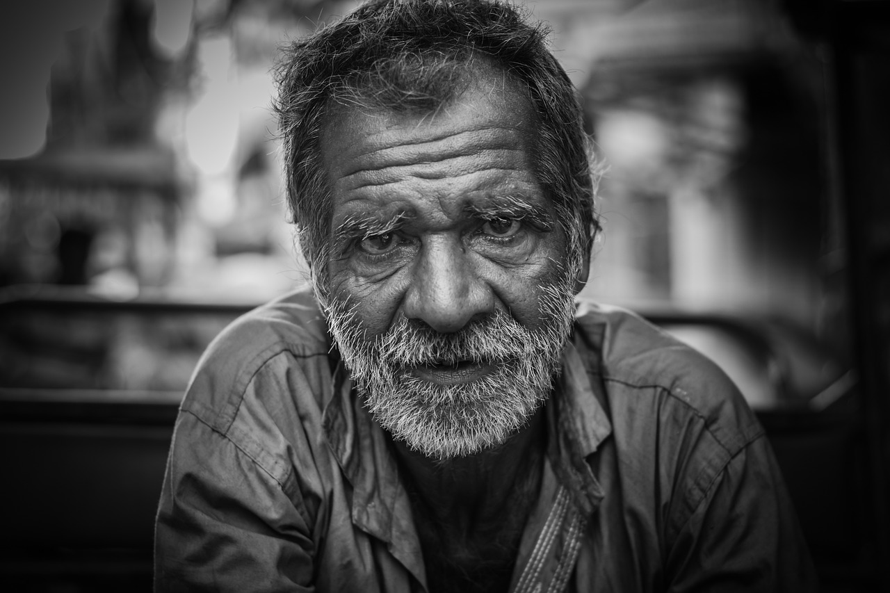 a black and white photo of a man with a beard, by Joze Ciuha, trending on pixabay, donald trump as a homeless man, portrait of a old, beautiful portrait of a hopeless, wideangle portrait
