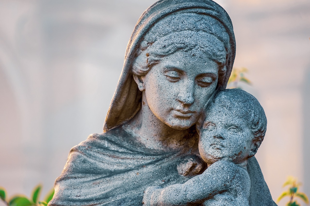 a statue of a woman holding a baby, a statue, by Romano Vio, pixabay, fine art, orthodox christianity, head and shoulder shot, made from old stone, istock