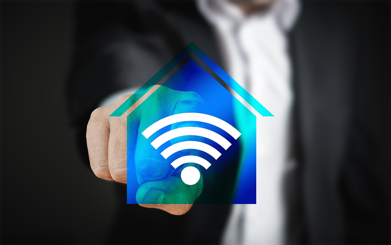 a man in a suit holding a smart phone with a wifi icon on it, a hologram, by Sam Black, pixabay, art nouveau, house and home, with pointing finger, at home, albuquerque