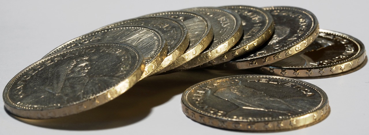 a pile of coins sitting on top of each other, by David Simpson, thin gold details, contain, silver, stunnig