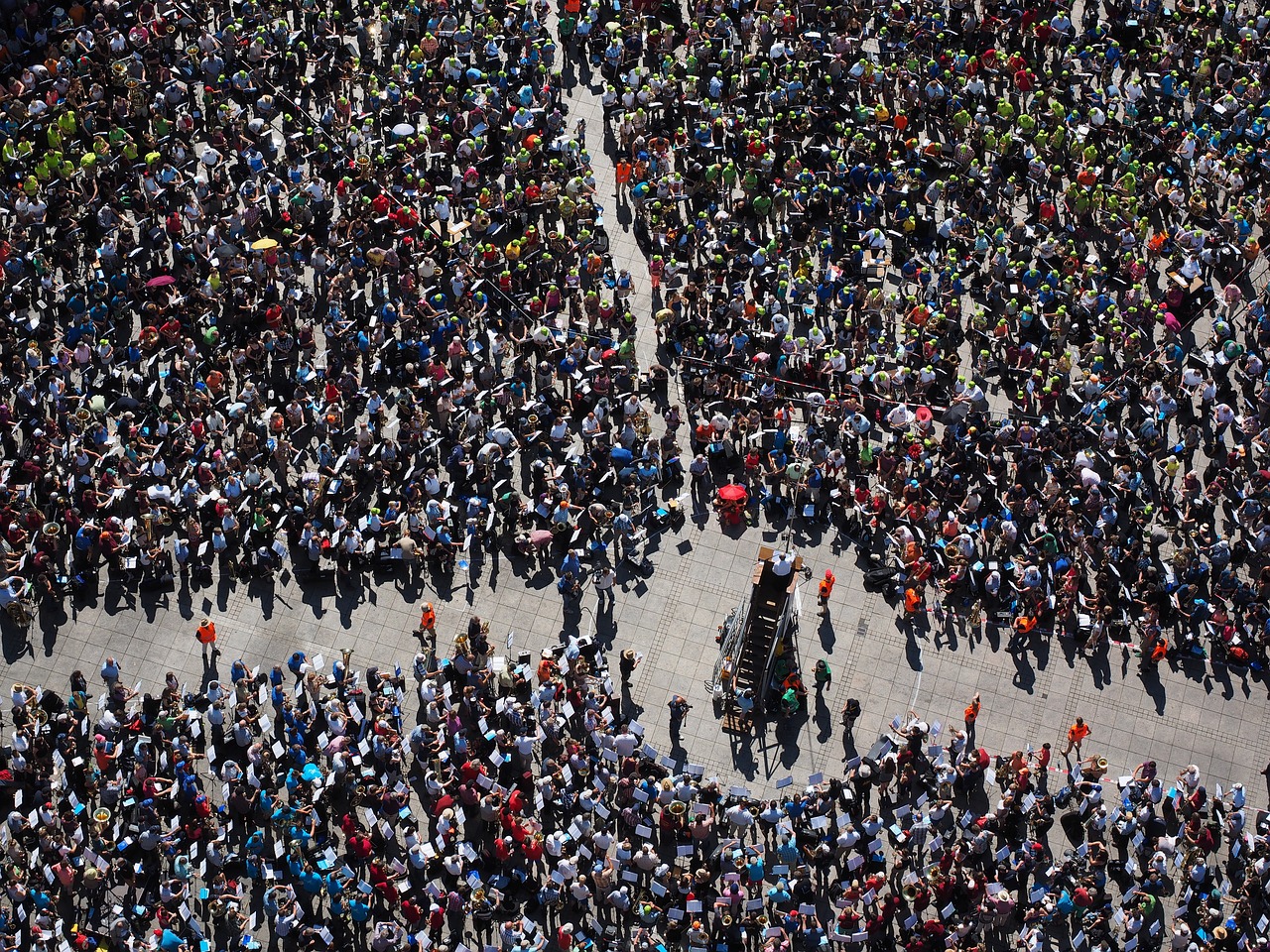 an aerial view of a large crowd of people, a photo, by Liang Kai, toronto, one motorbike in center of frame, gigapixel photo, hi resolution