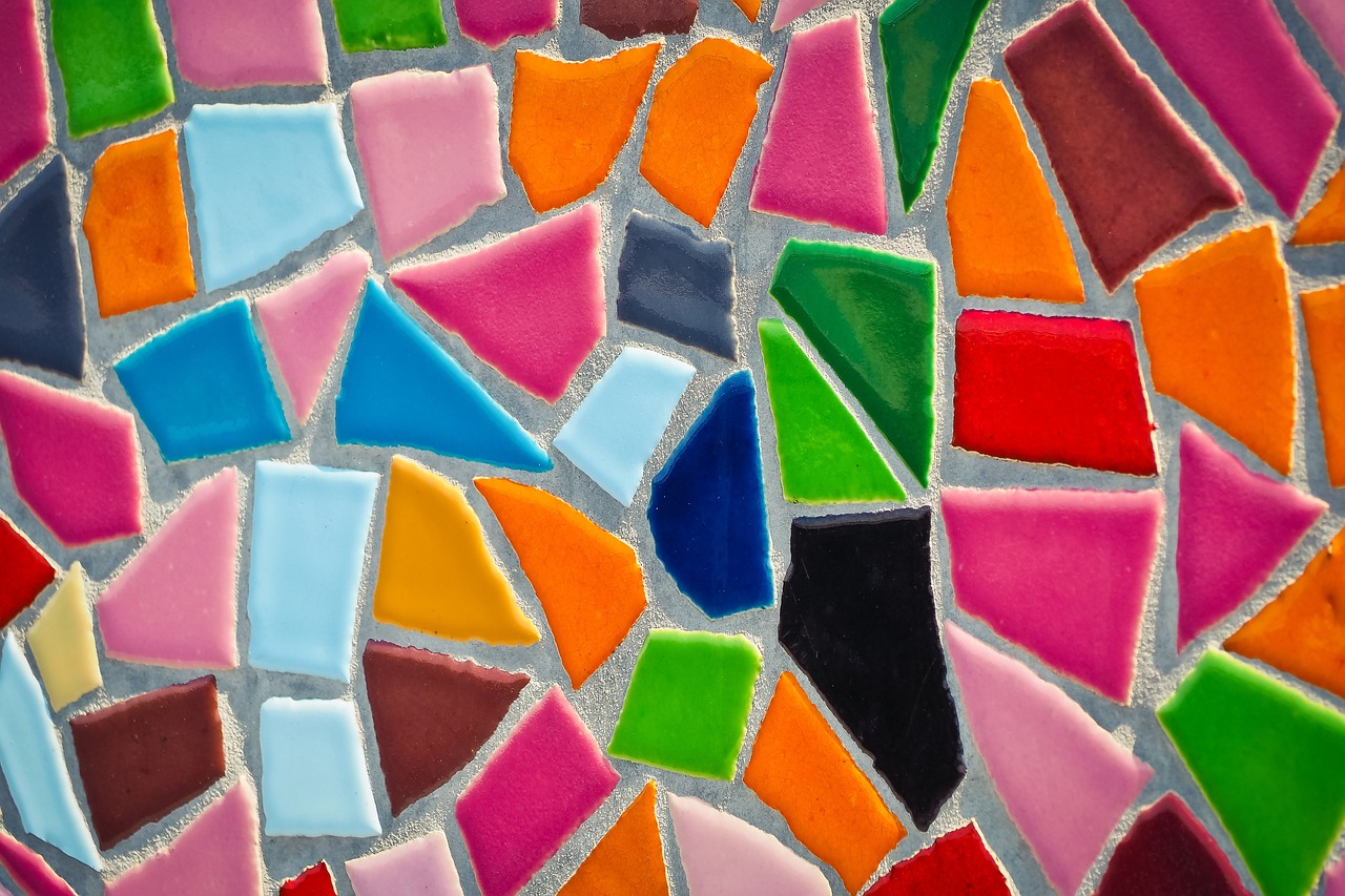 a close up of a colorful mosaic tile, a mosaic, inspired by Gaudi, pexels, color field, full of colour 8-w 1024, soft cracks, minimalist, tile floor