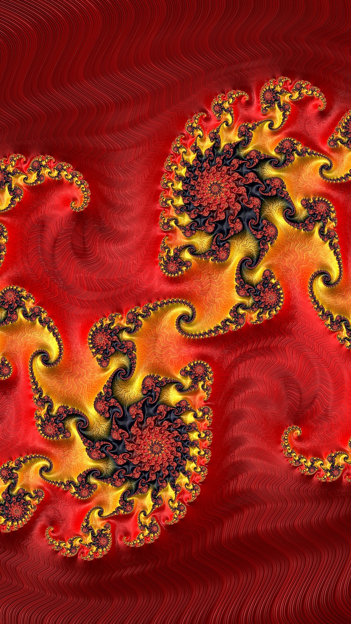 a close up of a piece of art on a red surface, a digital rendering, inspired by Benoit B. Mandelbrot, fire dragon, repeating fabric pattern, dark oranges reds and yellows, spiral horns!