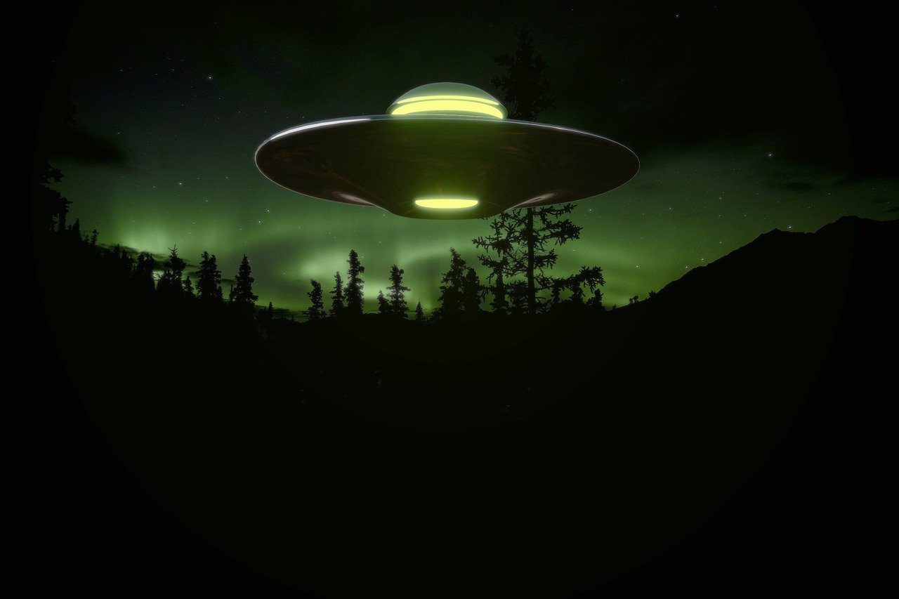 an alien spaceship flying over a forest at night, shutterstock, northen lights background, flying saucer in the sky, realistic footage, in honor of saturn