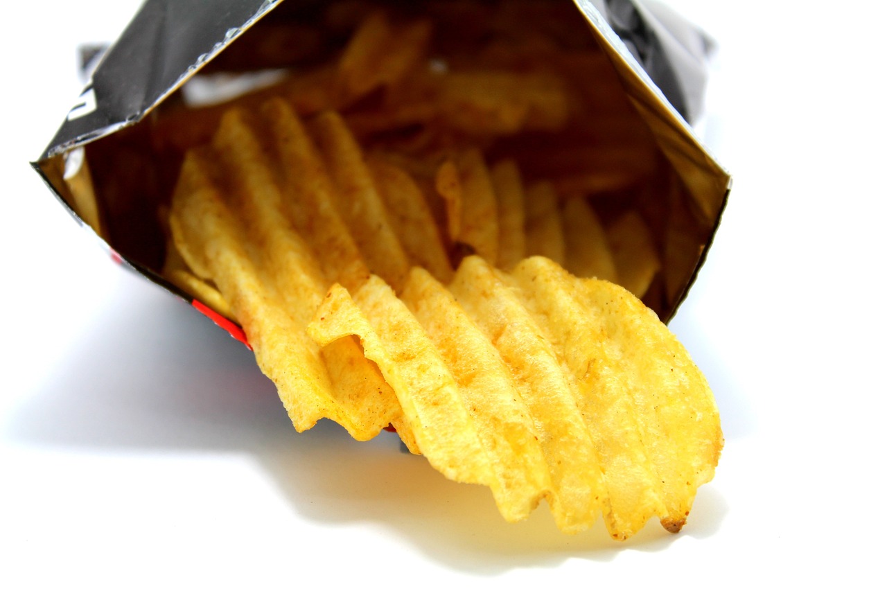 a close up of a bag of potato chips, hard lines, photo taken from behind, istockphoto, photo taken on a nikon