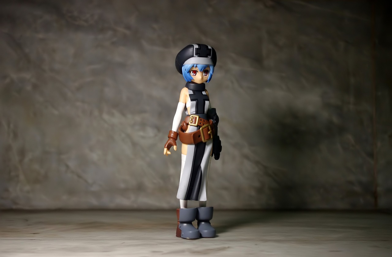 a close up of a toy figure on a table, a character portrait, inspired by Rei Kamoi, polycount, art style of dark cloud 2, female sheriff, fullbody photo, star wars character