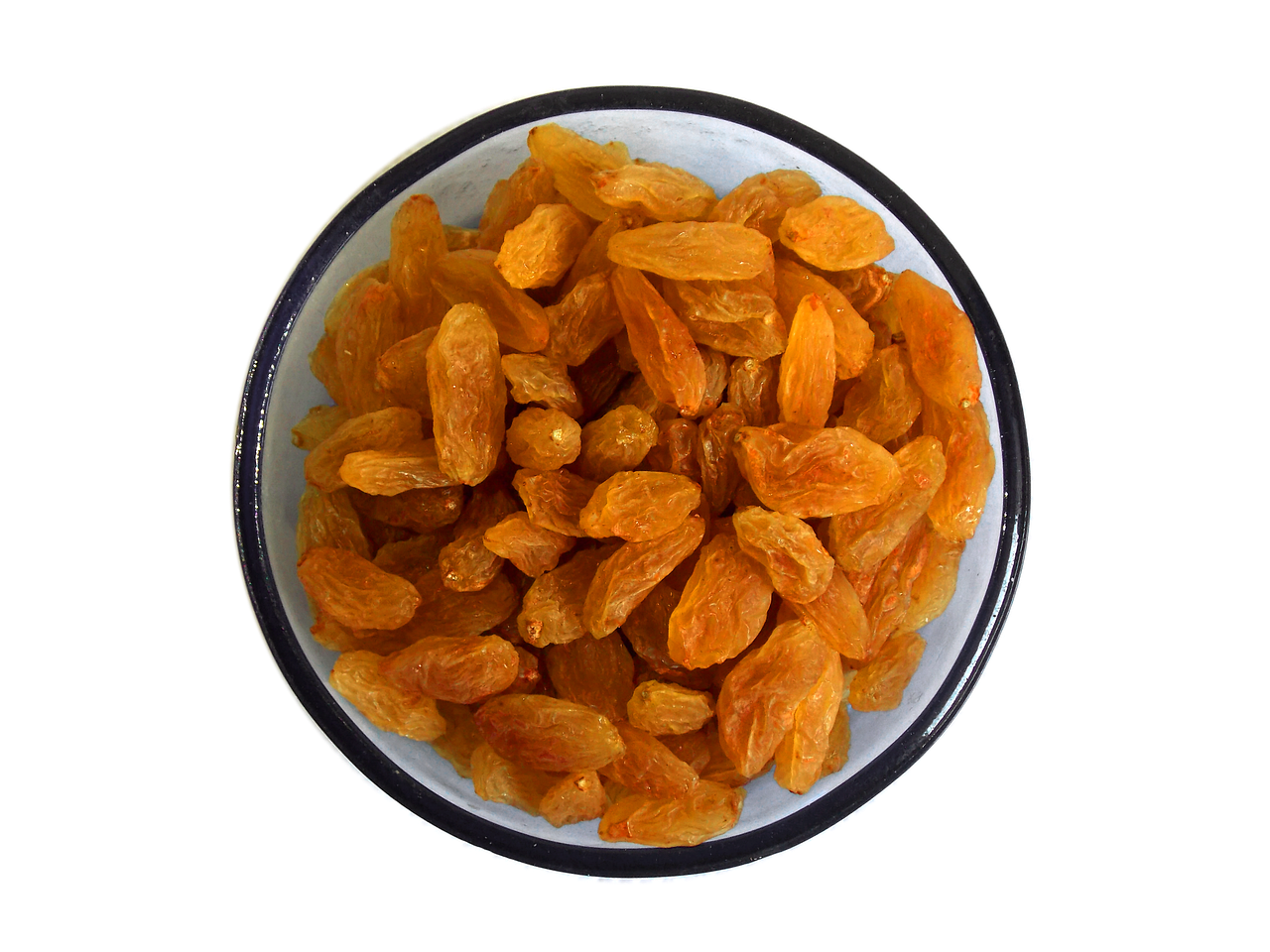 a bowl filled with raisins sitting on top of a table, hurufiyya, highly detailed product photo, on a black background, orange color, view from bottom to top