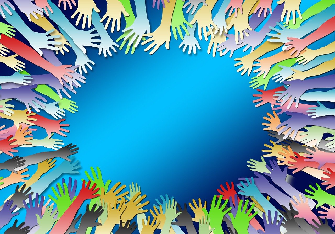 a group of multicolored hands surrounding a blue circle, an illustration of, conceptual art, paper cut out, random background scene, crowds, banner