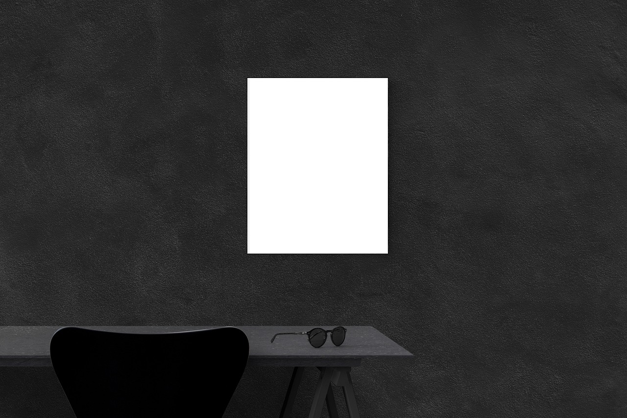 a laptop computer sitting on top of a wooden desk, a minimalist painting, inspired by Jan Kupecký, postminimalism, pure black, large vertical blank spaces, poster template on canva, high resolution product photo