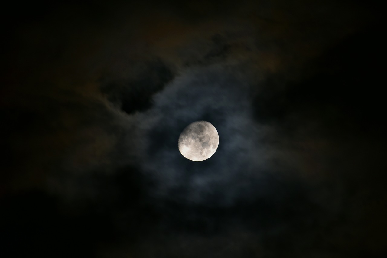 a full moon is seen through the clouds, a portrait, flickr, hurufiyya, photography, black moons