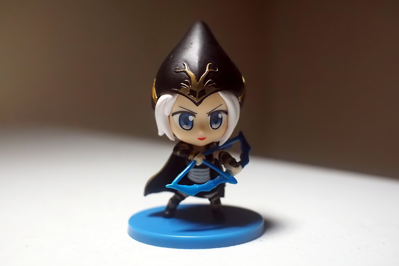 a close up of a figurine on a table, by Yang J, polycount, fox from league of legends chibi, female archer, arthas, close up front view