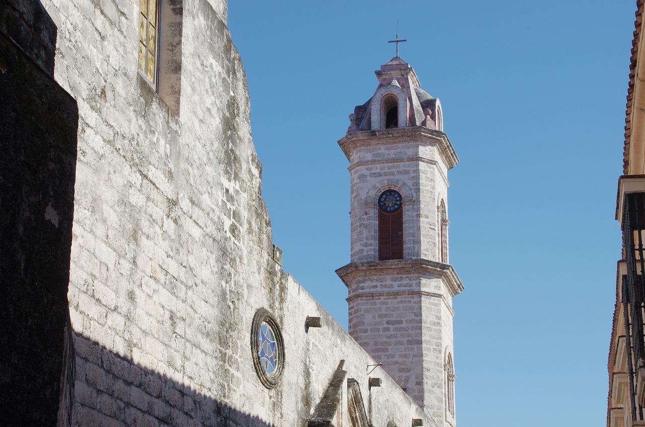 a clock that is on the side of a building, inspired by Pedro Álvarez Castelló, romanesque, neoclassical tower with dome, bispo do rosario, split near the left, trulli