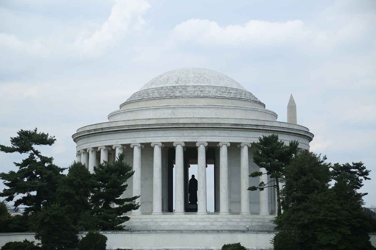 a man that is standing in front of a building, a statue, by Tom Carapic, flickr, neoclassicism, thomas jefferson, rounded roof, monolithic temple, observation deck