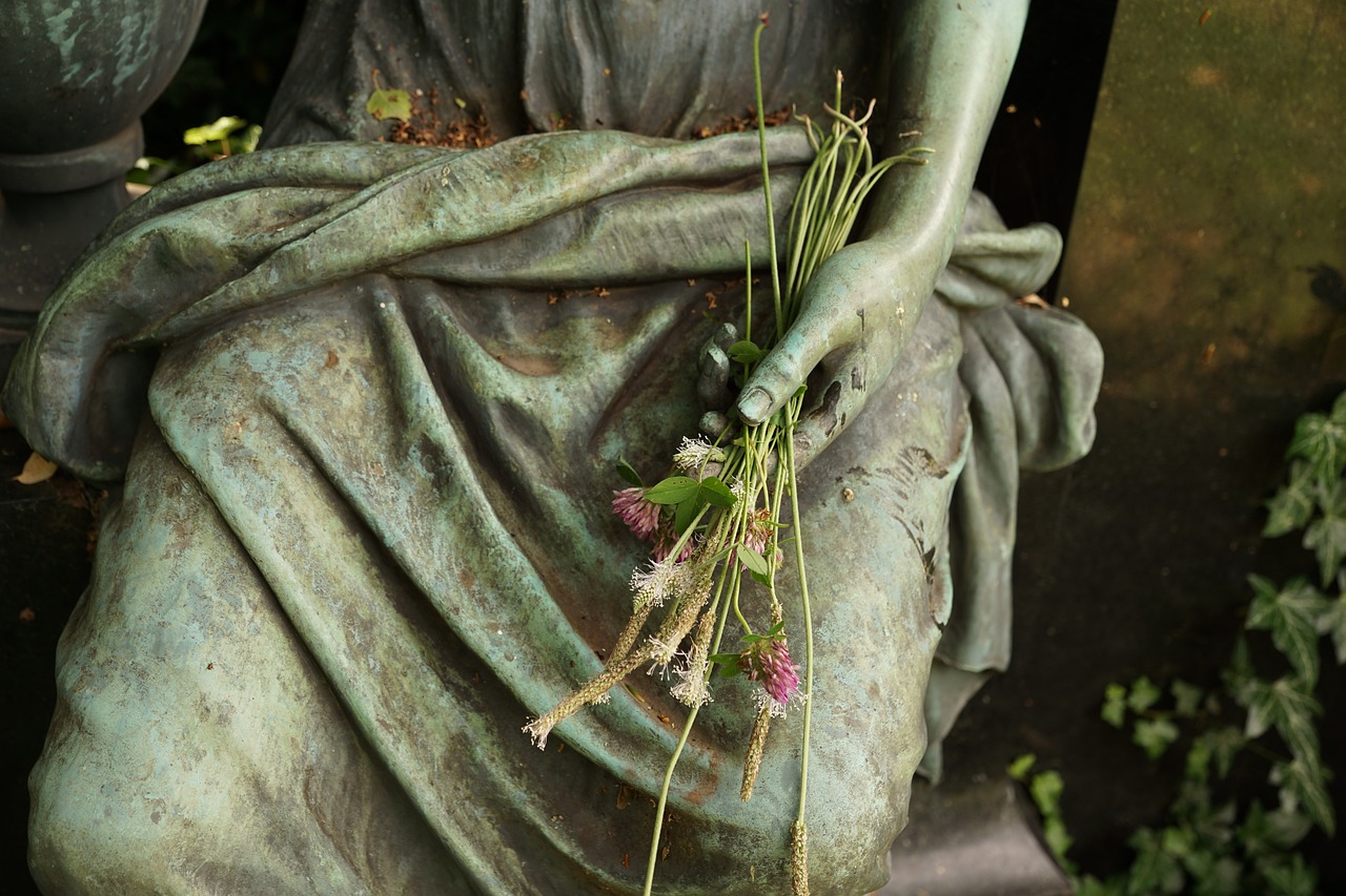 a statue of a woman holding a bunch of flowers, inspired by Edward Robert Hughes, flickr, sparse detail, momento mori, herbs, paris 2010