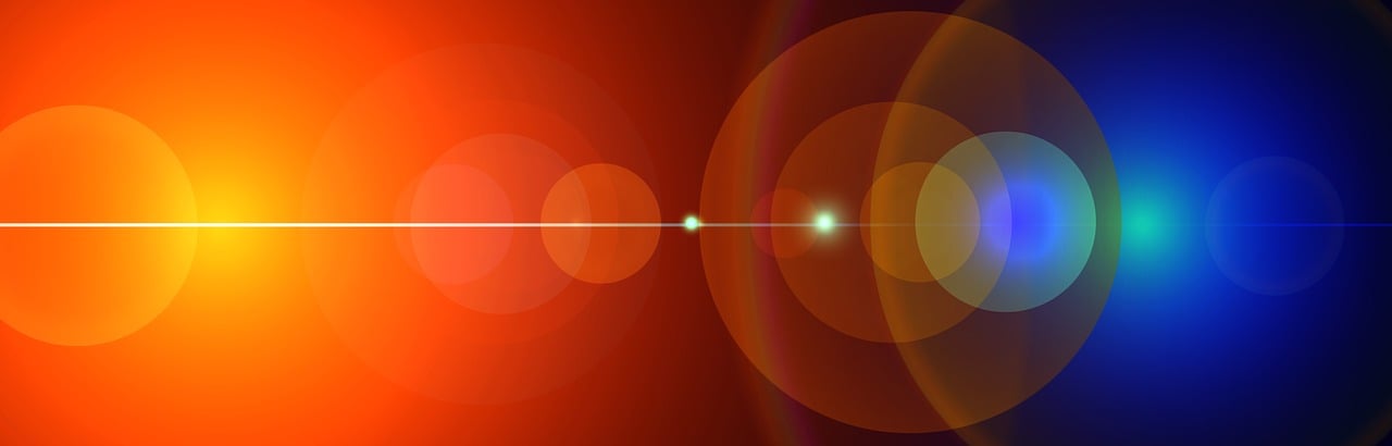 a close up of a red and blue light, a digital rendering, by Anna Füssli, pixabay, digital art, orange backgorund, orbs, of a ufo propulsion system, plain red background