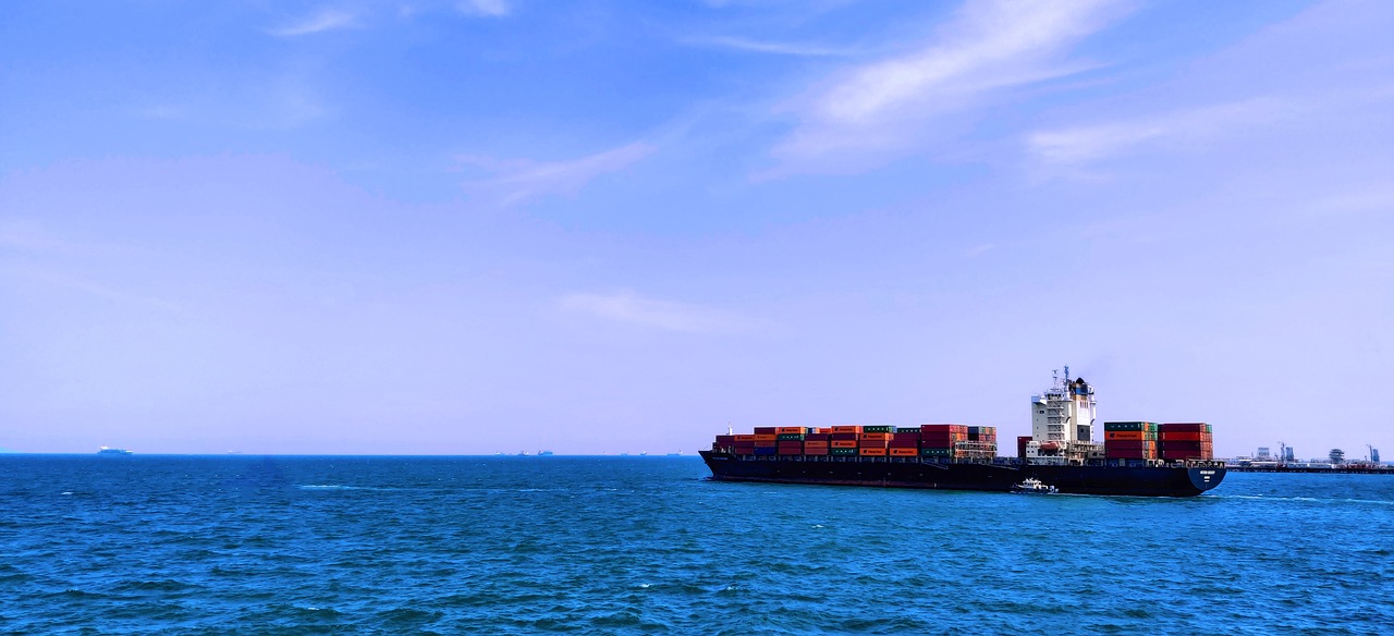 a large cargo ship in the middle of the ocean, minimalism, vivid vibrant colors, mobile wallpaper, stock photo, shipping containers