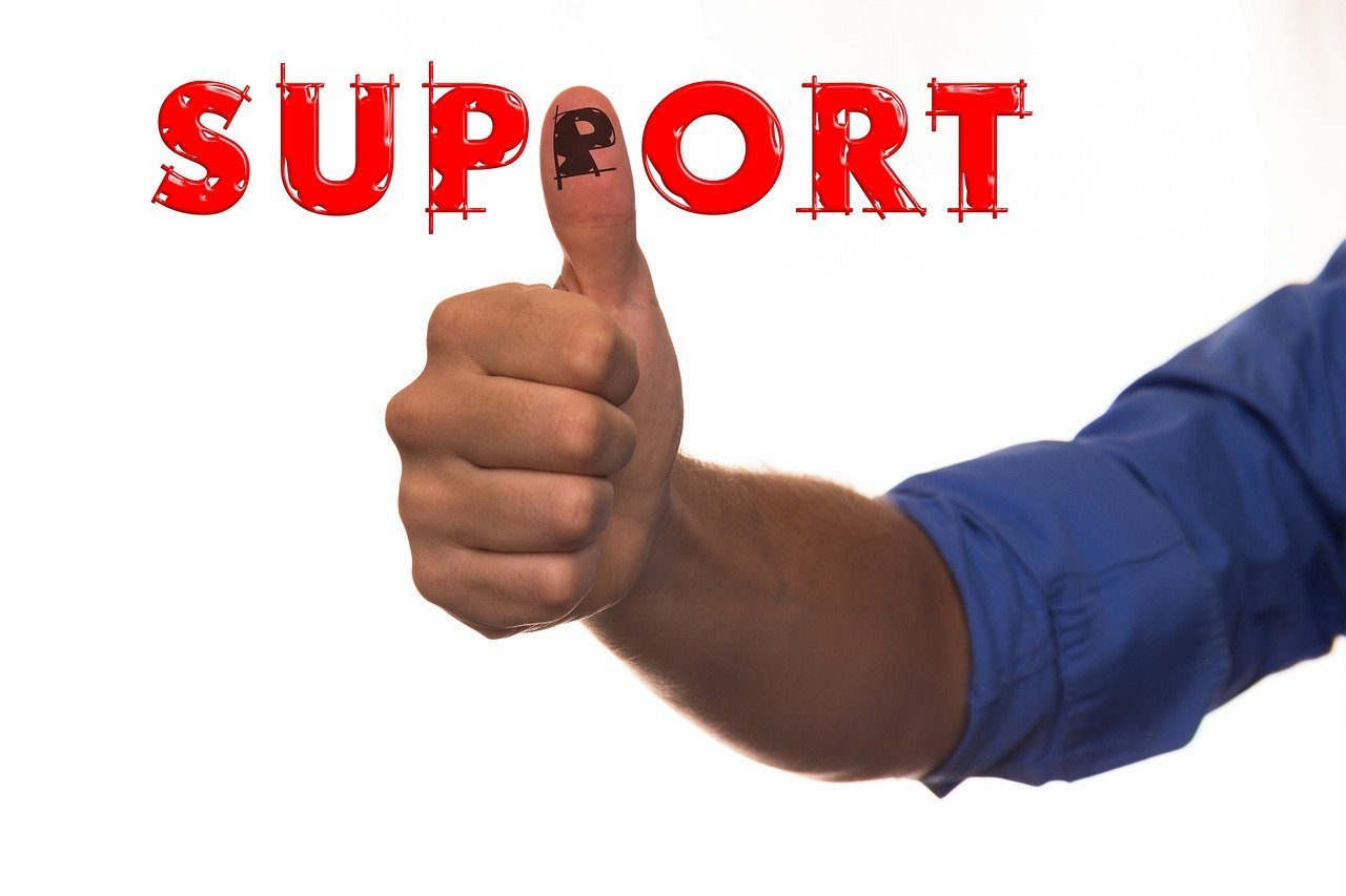 a close up of a person giving a thumbs up, a stock photo, figuration libre, support, with text, super technical, portlet photo