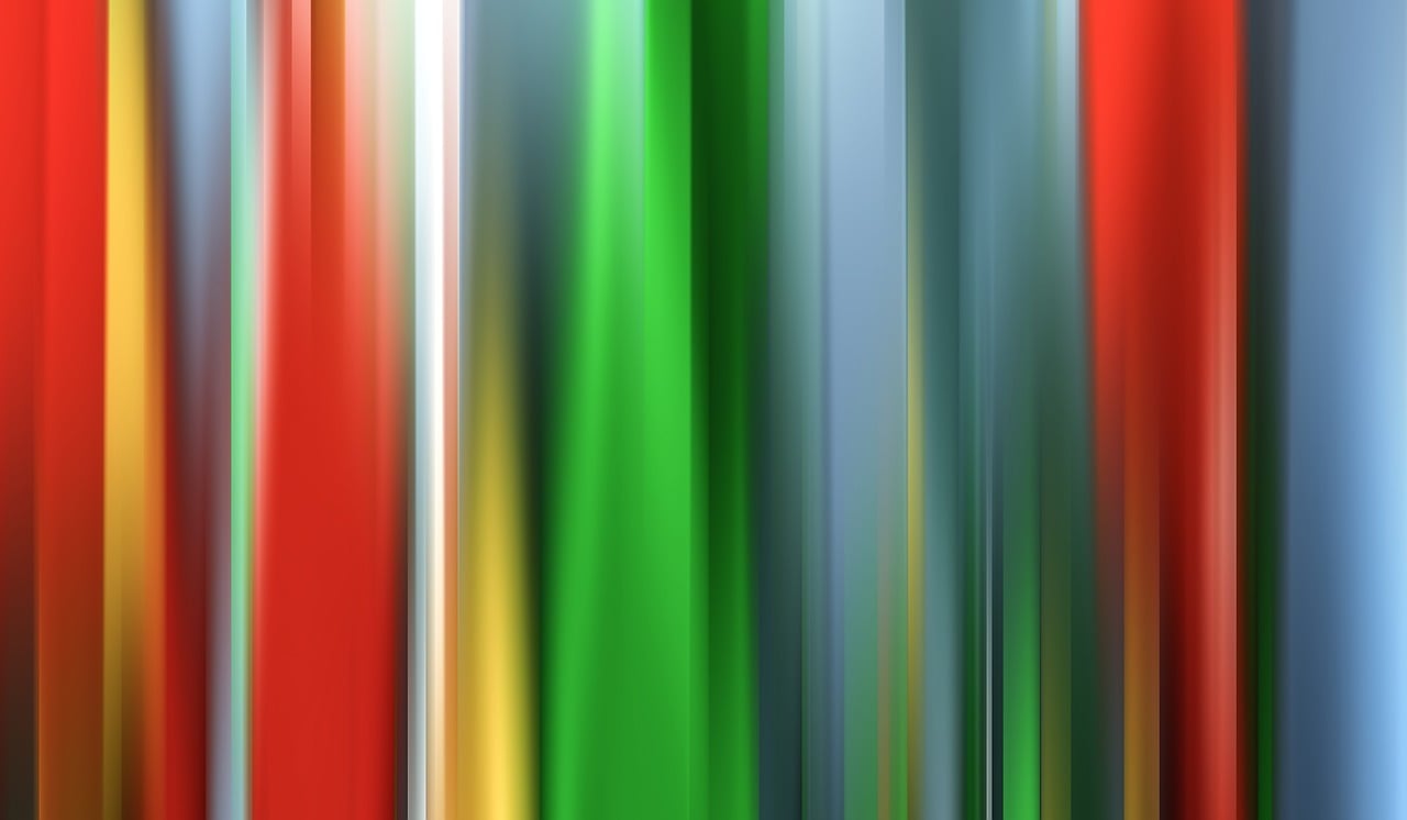 a blurry photo of a multicolored background, a picture, inspired by Morris Louis Bernstein, unsplash, background made of big curtains, sleek spines, green bright red, straight smooth vertical