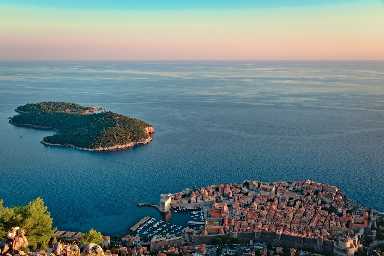 a small island in the middle of a large body of water, by Juergen von Huendeberg, pexels, renaissance, dubrovnik, sun and shadow over a city, ultrawide lens”, bird's eye