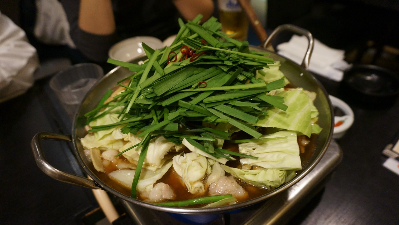 a close up of a pot of food on a table, pixabay, shin hanga, pus - filled boils, gills, greens, fully body photo