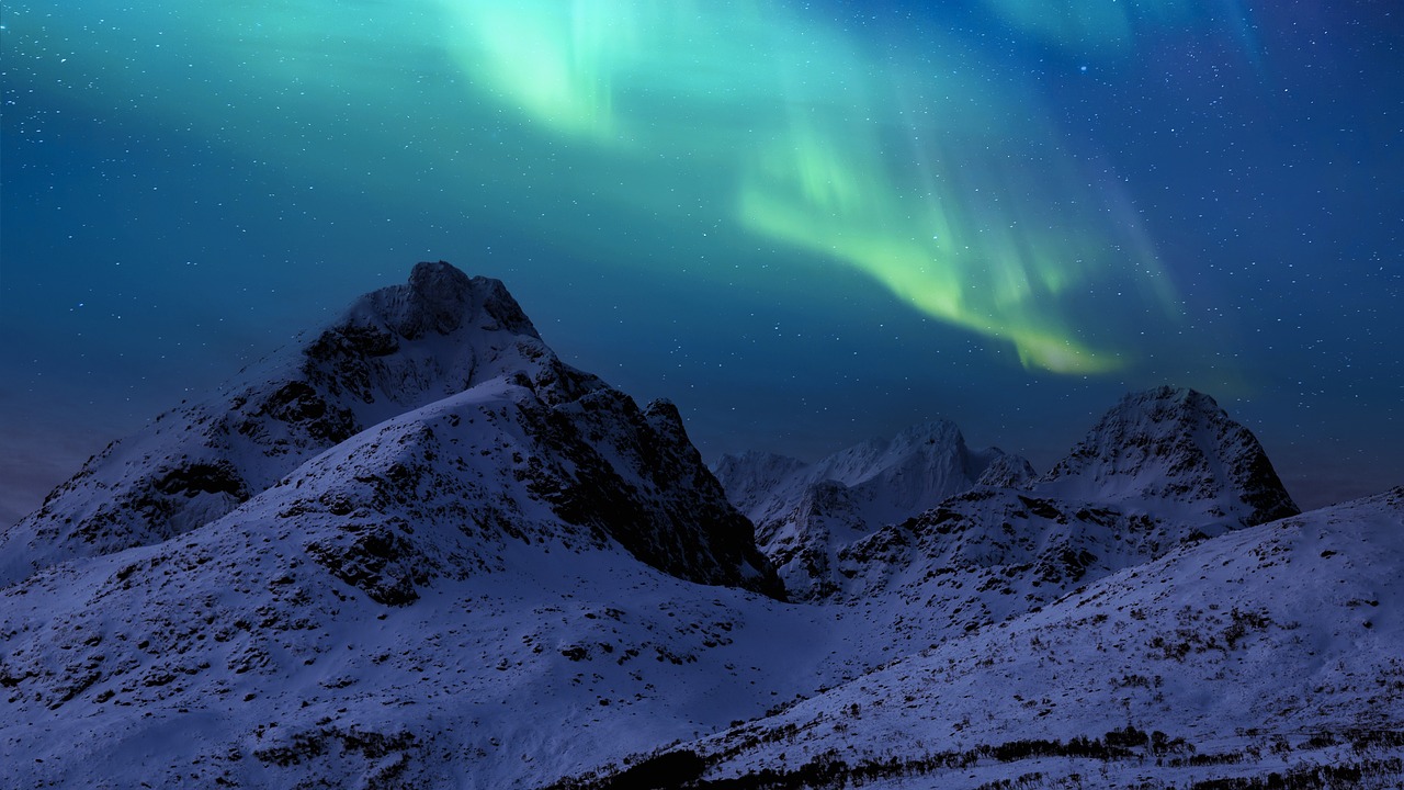 the northern lights shine brightly in the sky above a snowy mountain range, by Anato Finnstark, pixabay, digital art, istockphoto, featured, gorgeous beautiful, norse